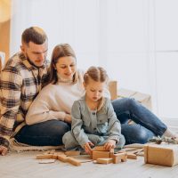 Family with little daughter together on Christmas